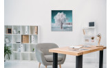 Akustikbild Schneebedeckter Baum unter blauem Himmel